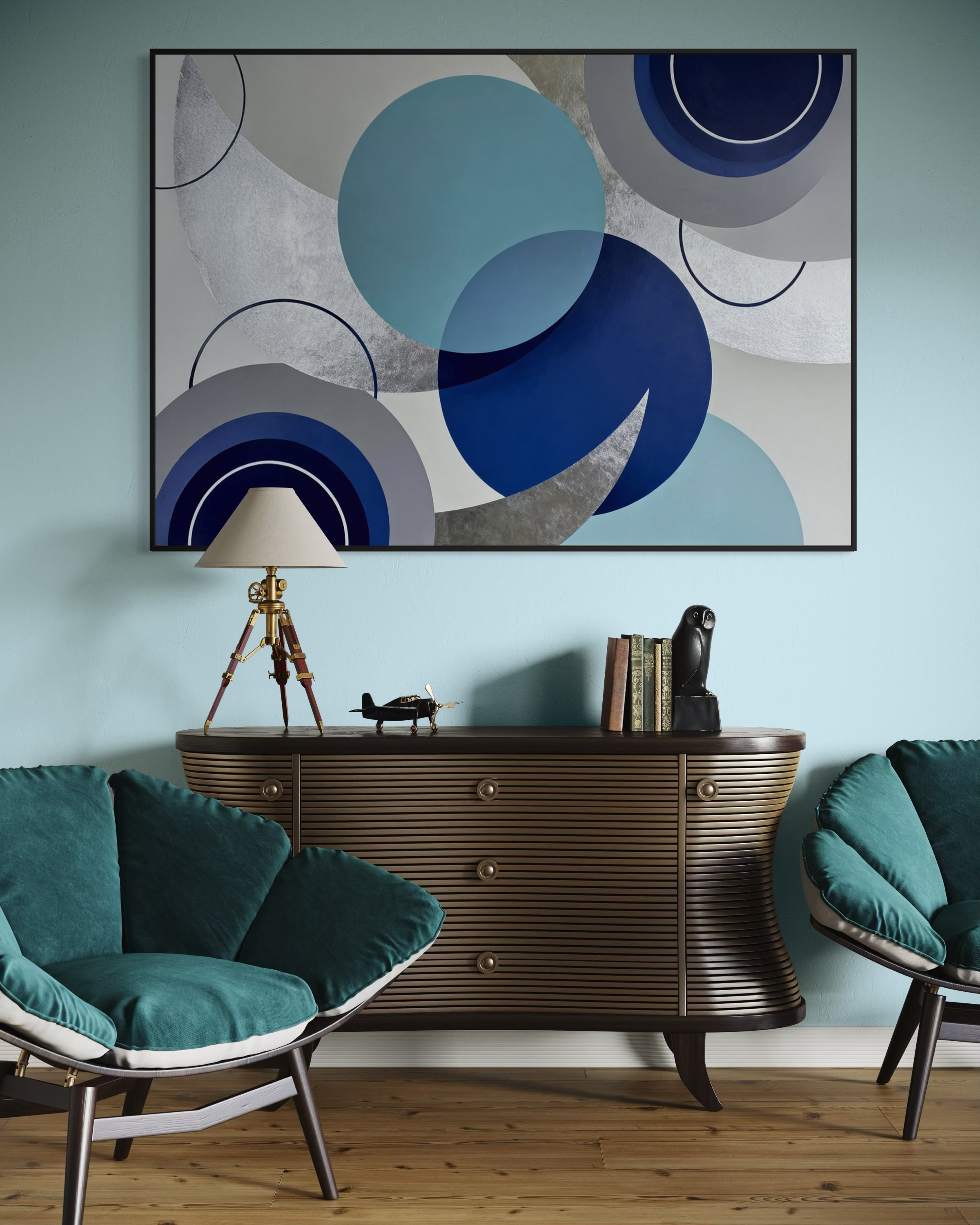 Stampa incorniciata con grafica astratta blu e turchese, cerchi e forme curve