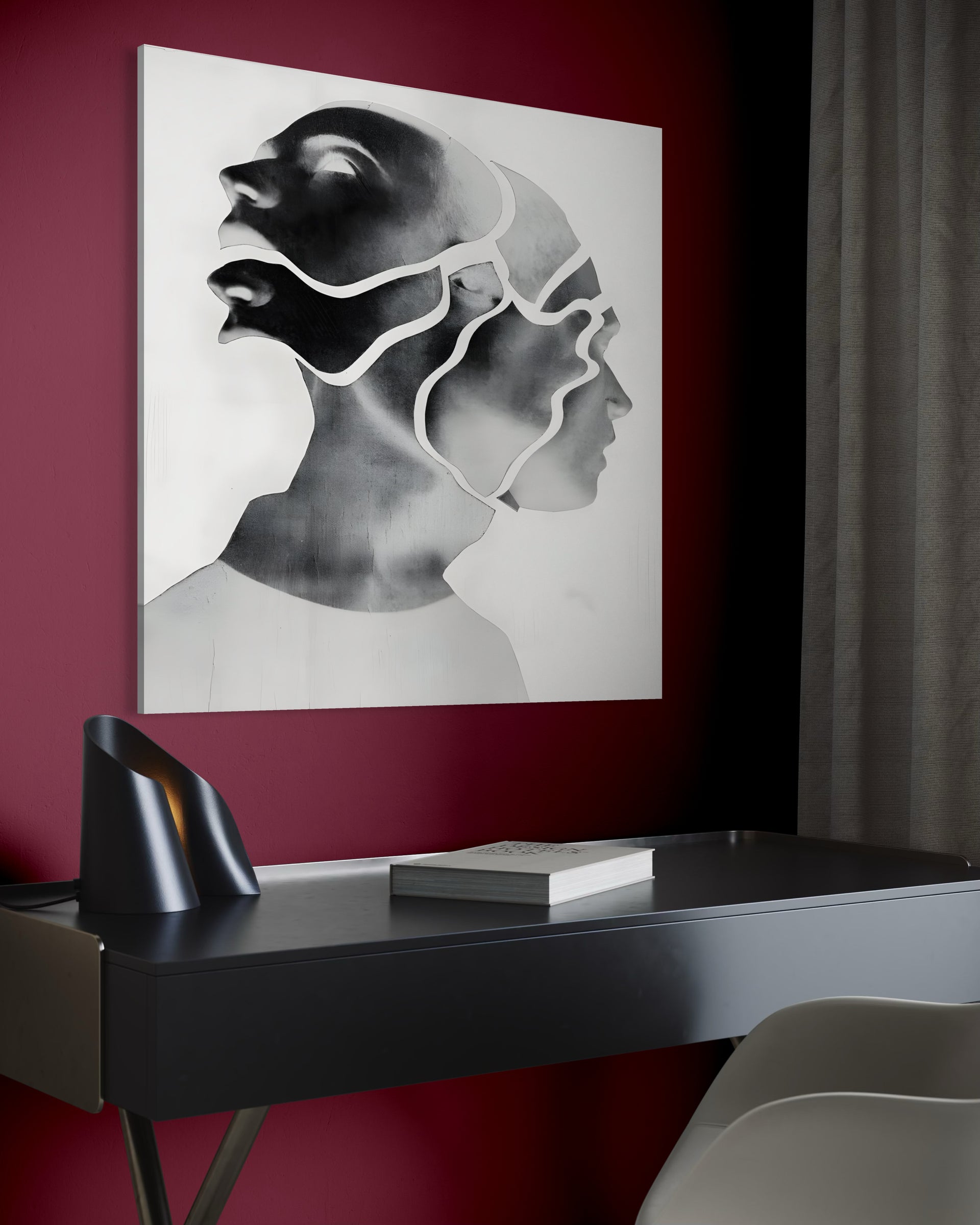Quadro Viso scomposto, cornice bianca, profili scissi in nero su sfondo chiaro.