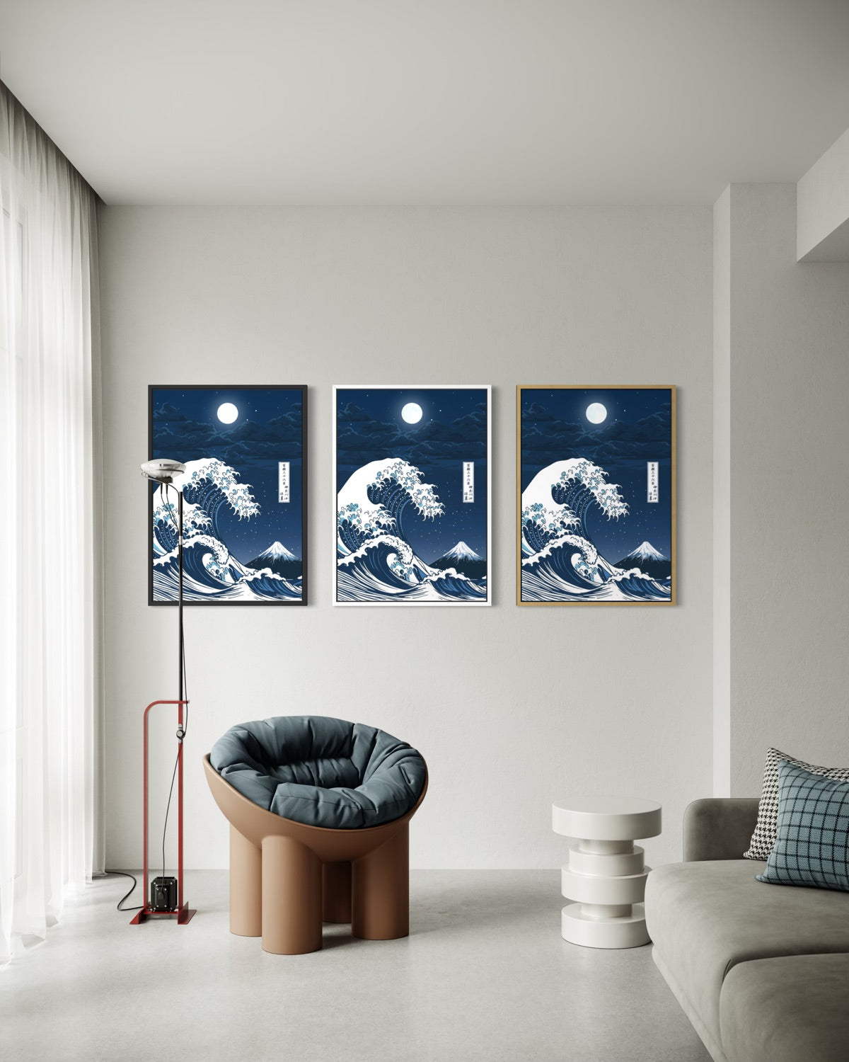 Tre stampe incorniciate con onda blu e luna su sfondo scuro, disposte in fila