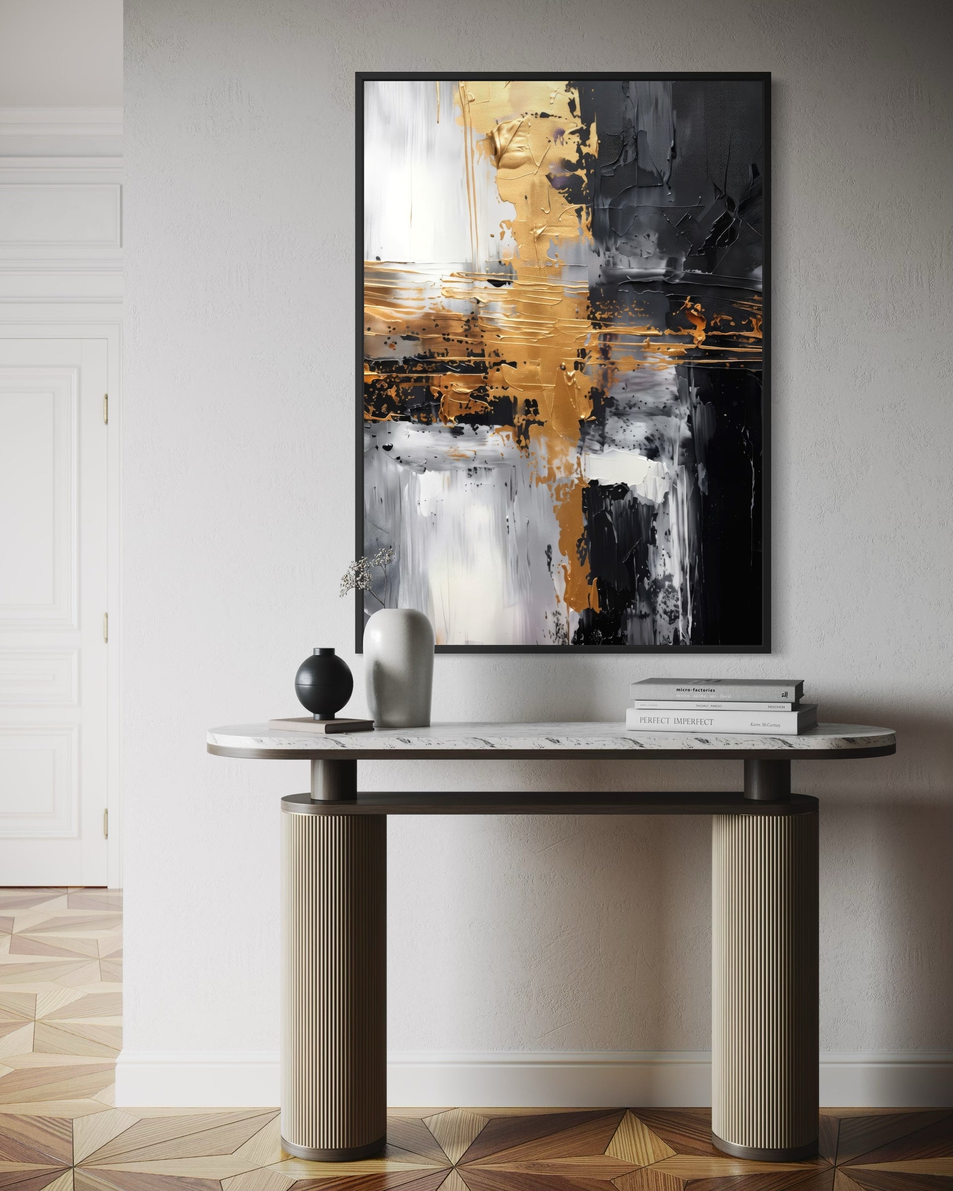 Quadro astratto con cornice nera e macchie oro, bianco e nero