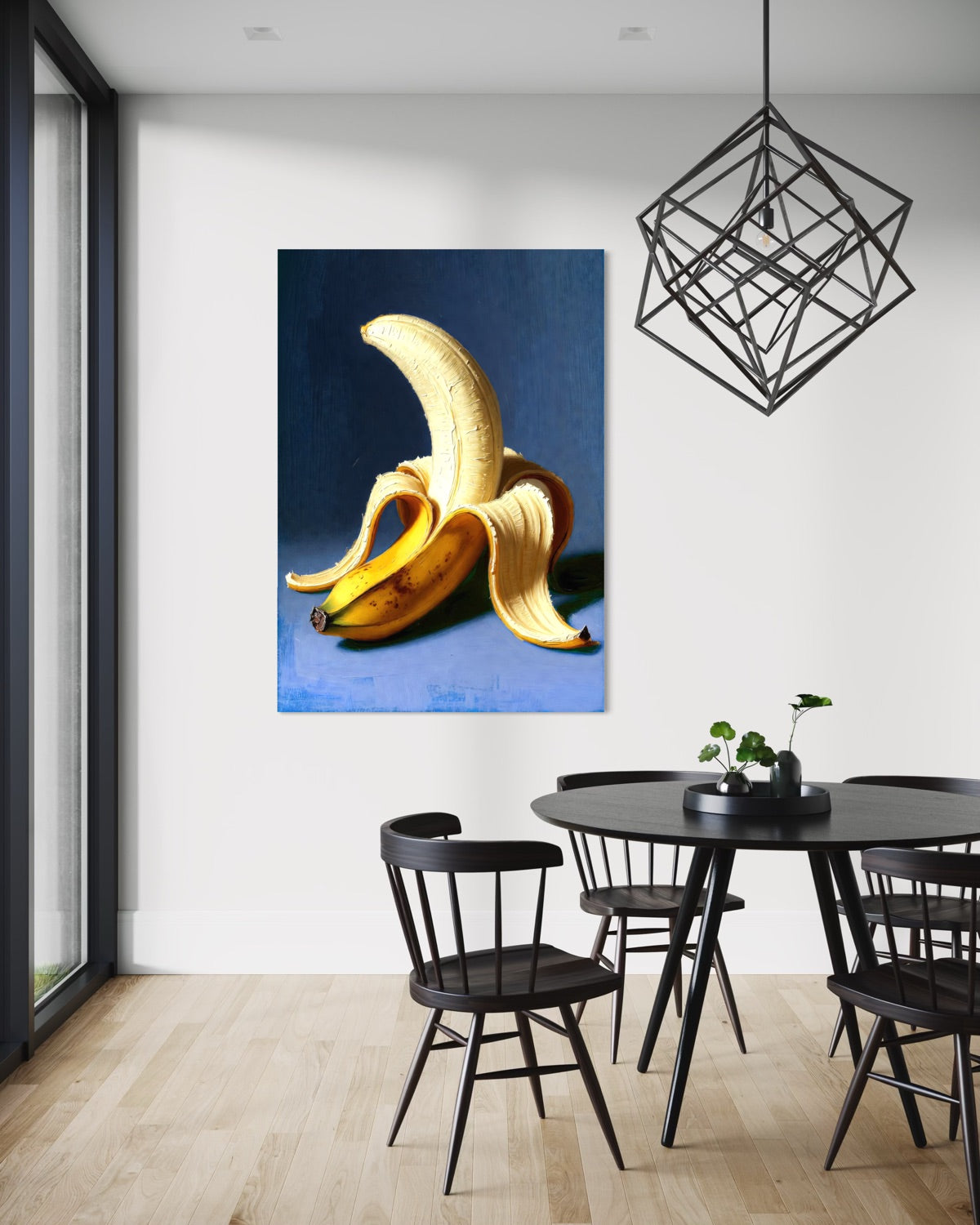 Stampa su tela con cornice scura e banane dorate su sfondo blu