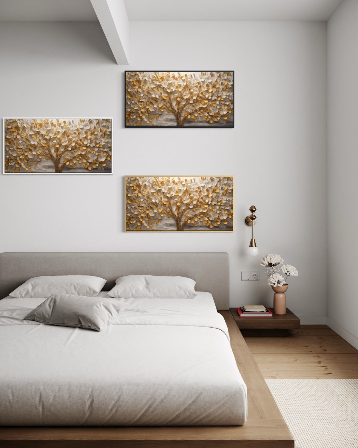 3 quadri con albero intrecciato, cornici scure, foglie dorate e tronco grigio