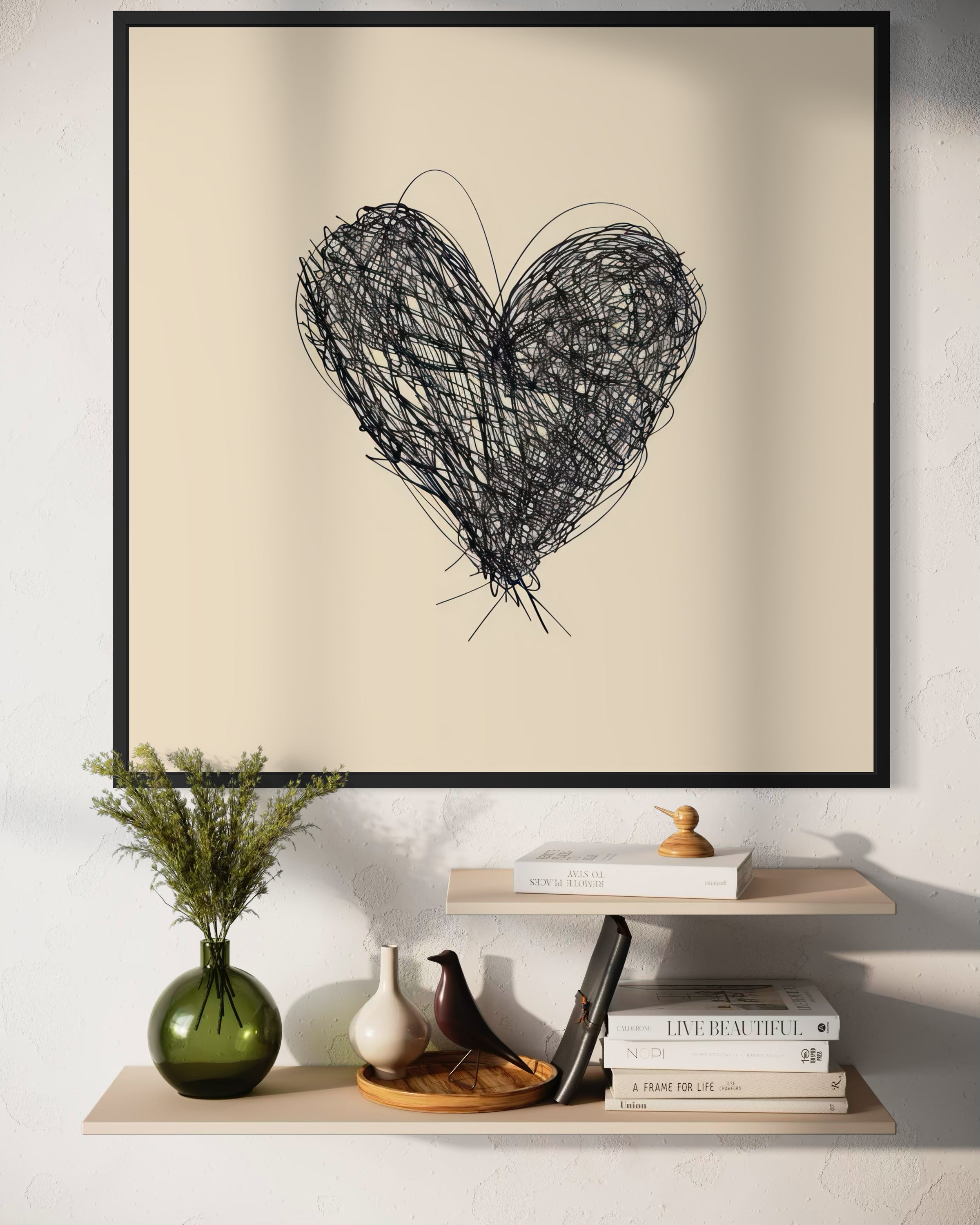 Amore confuso: cuore in filo nero in cornice nera